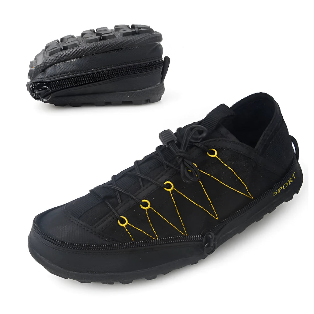 Orange portable folding outdoor hiking shoe with side zipper on a grey background.