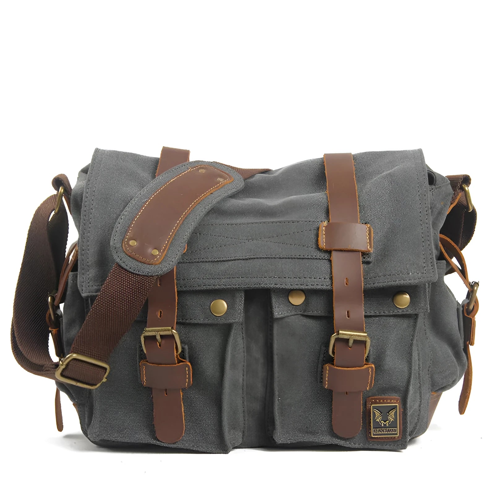 Men's brown retro canvas crossbody shoulder bag with cowhide trim, shown with flap open revealing internal zip pockets.