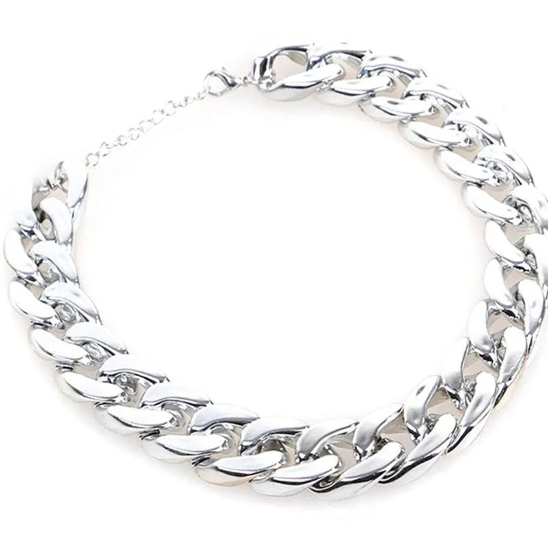 Geometric chain dog collar with gold finish and adjustable buckle for small to medium-sized dogs