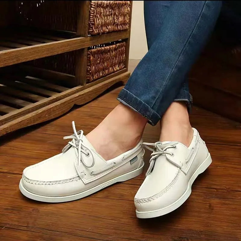 Men's solid colour casual shoes with round toe and flat heel on a white background.