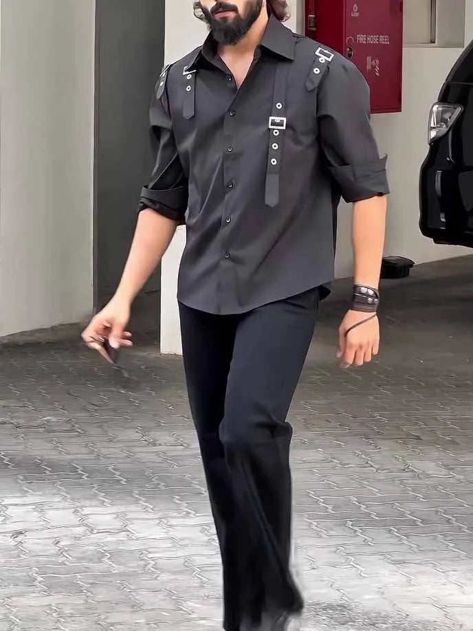 A man's black utility-style button-up shirt with a regular fit, laid flat.