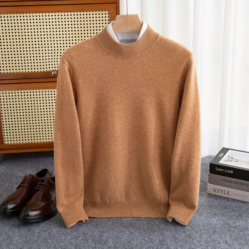 Man wearing a loose-fit half-collar wool sweater in a dark colour, showcasing the knitted texture and neckline design.