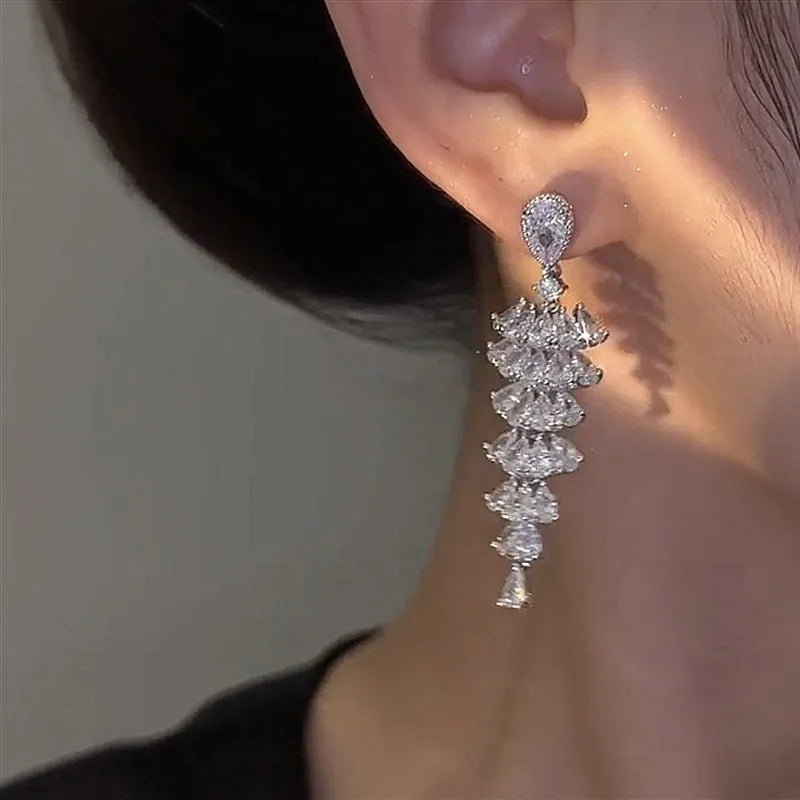 Silver pagoda Christmas tree drop earrings with sparkling zircon crystals on copper stud earrings