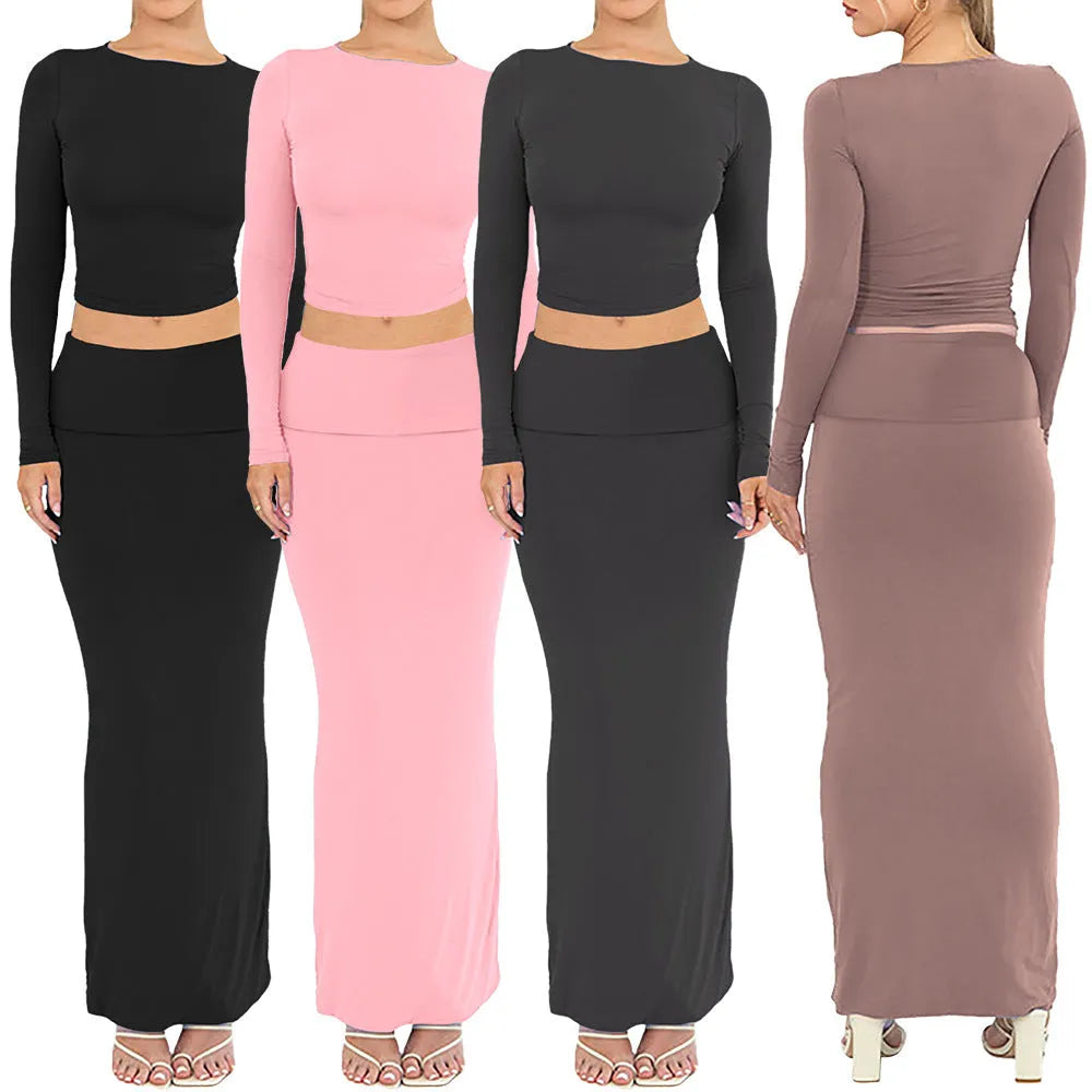 Women's sweet style two-piece suit set with long skirt and three-quarter sleeves in solid colour.