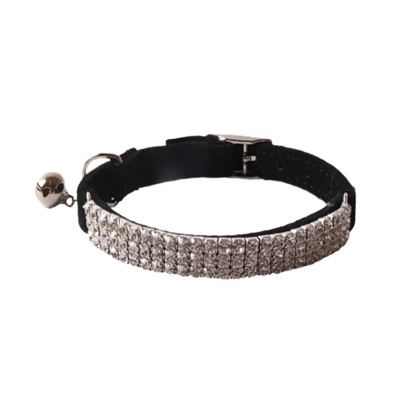 Colourful flocking fabric cat collar with elastic buckle shown in pink, black, and blue options