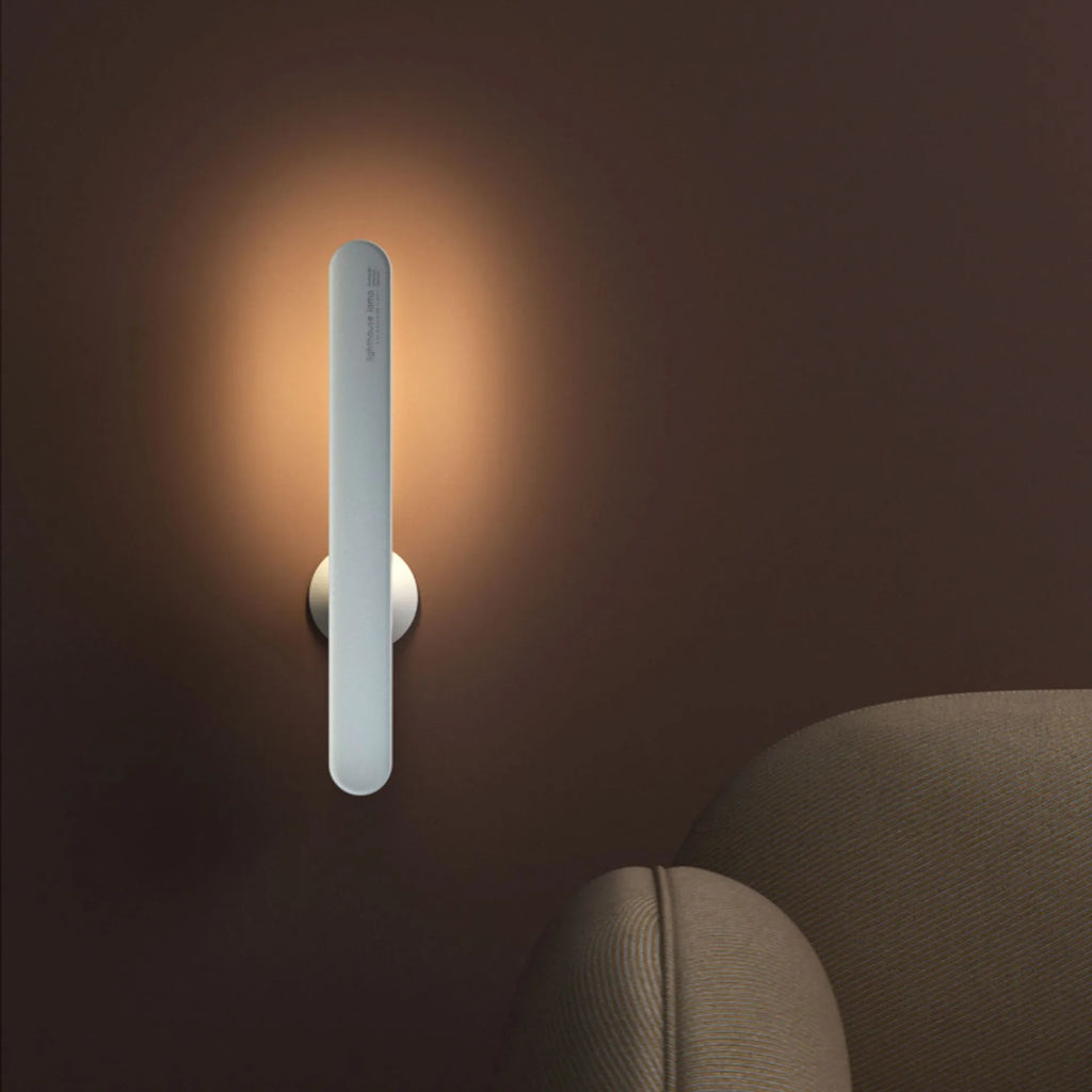 Geometric desk lamp with magnetic base in white or khaki colour
