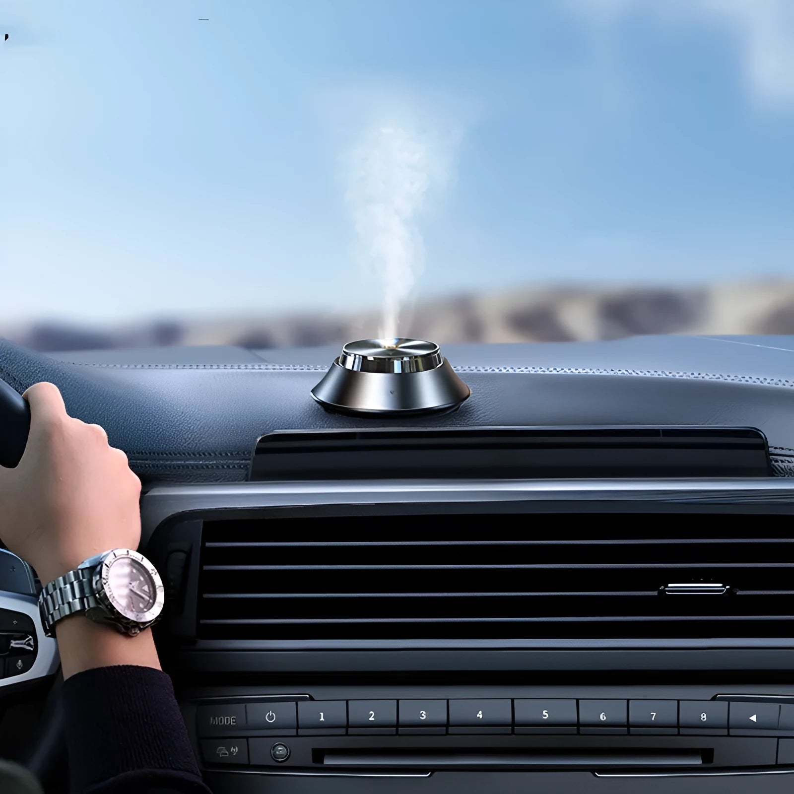 Black metal butterfly-shaped car aromatherapy diffuser with USB cable and essential oil bottle
