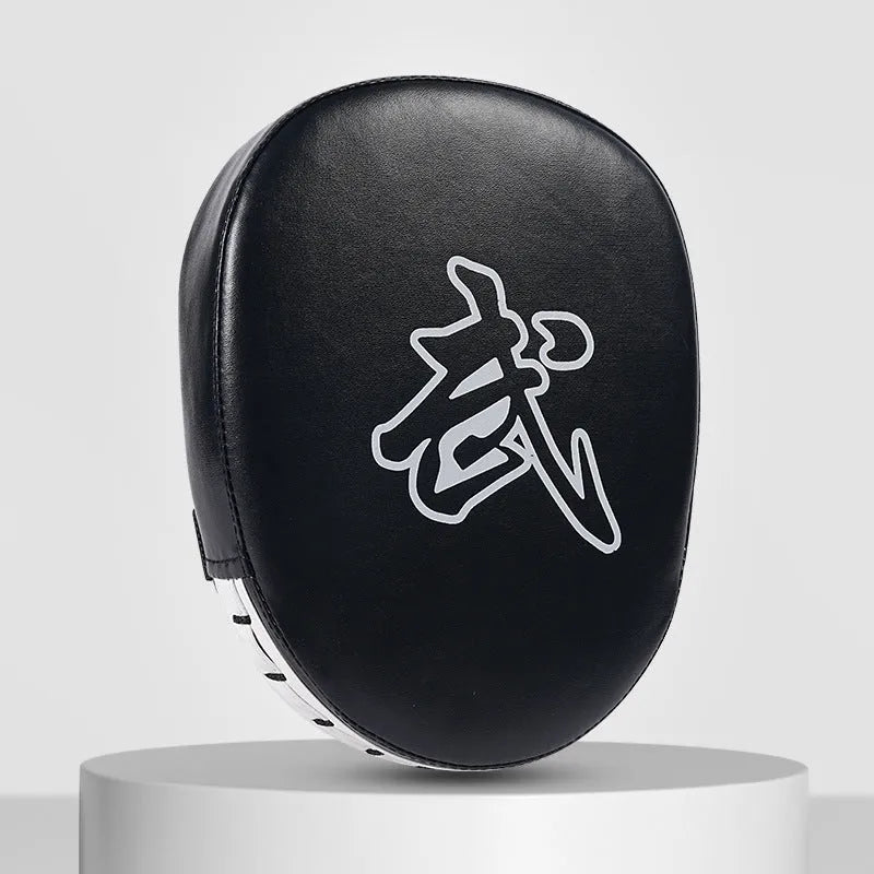 A pair of PU punch mitts for boxing and Muay Thai training, shown in a red edge and black surface colour variant.