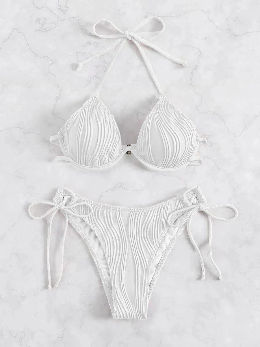 Women's apricot coloured bikini swimsuit with underwire support on a mannequin.