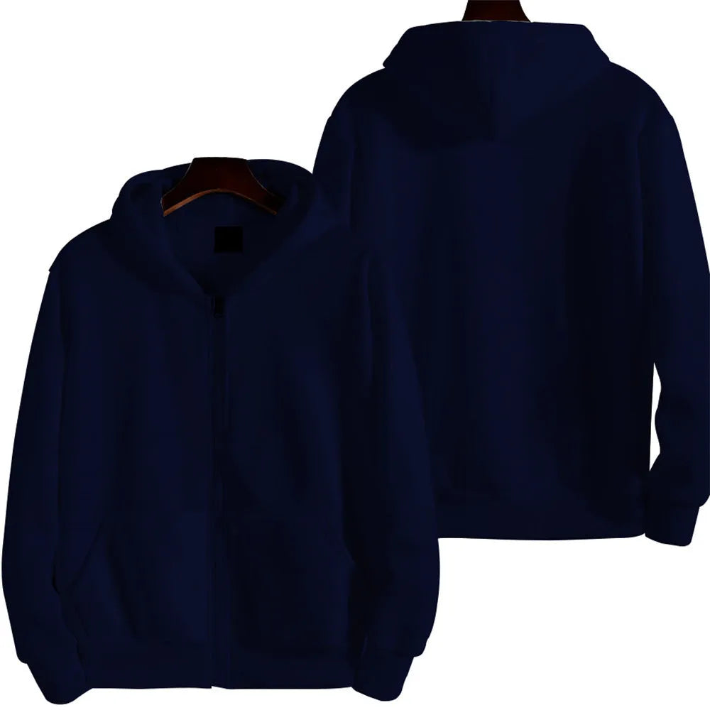 Man wearing a loose-fitting solid colour zip-up sports jacket in a cardigan style.