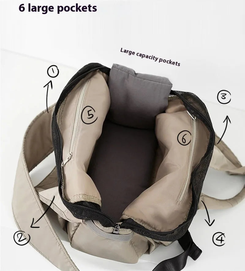 Apricot coloured cloth pet handbag measuring 41cm by 16cm by 28cm