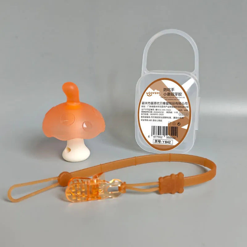 Small pink and nano colour mushroom gum latex stress balls in a transparent box with an optional chain.