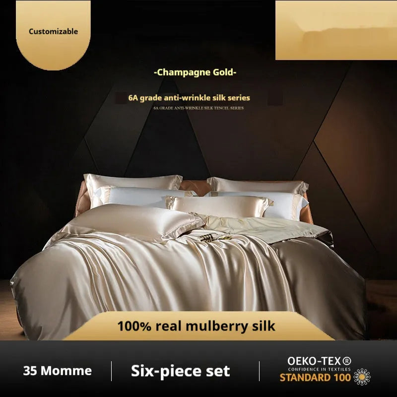 Silk four-piece quilt cover set in a solid colour displayed on a bed, showing the quilt cover and matching pillowcases.