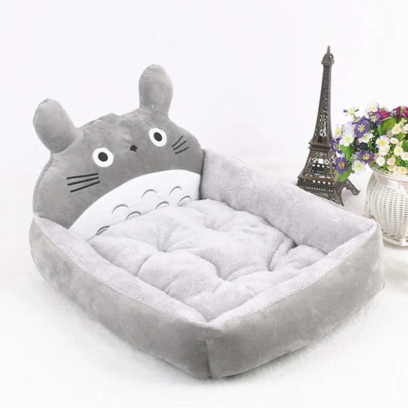 A cartoon-style washable pet bed sofa for small dogs and cats, shown in a blue colour.