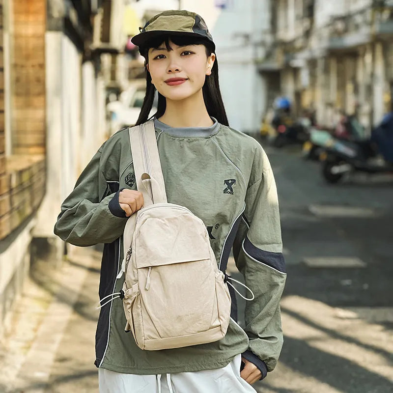 Black multi-functional waterproof nylon backpack with curved shoulder strap, free size, for men and women travel