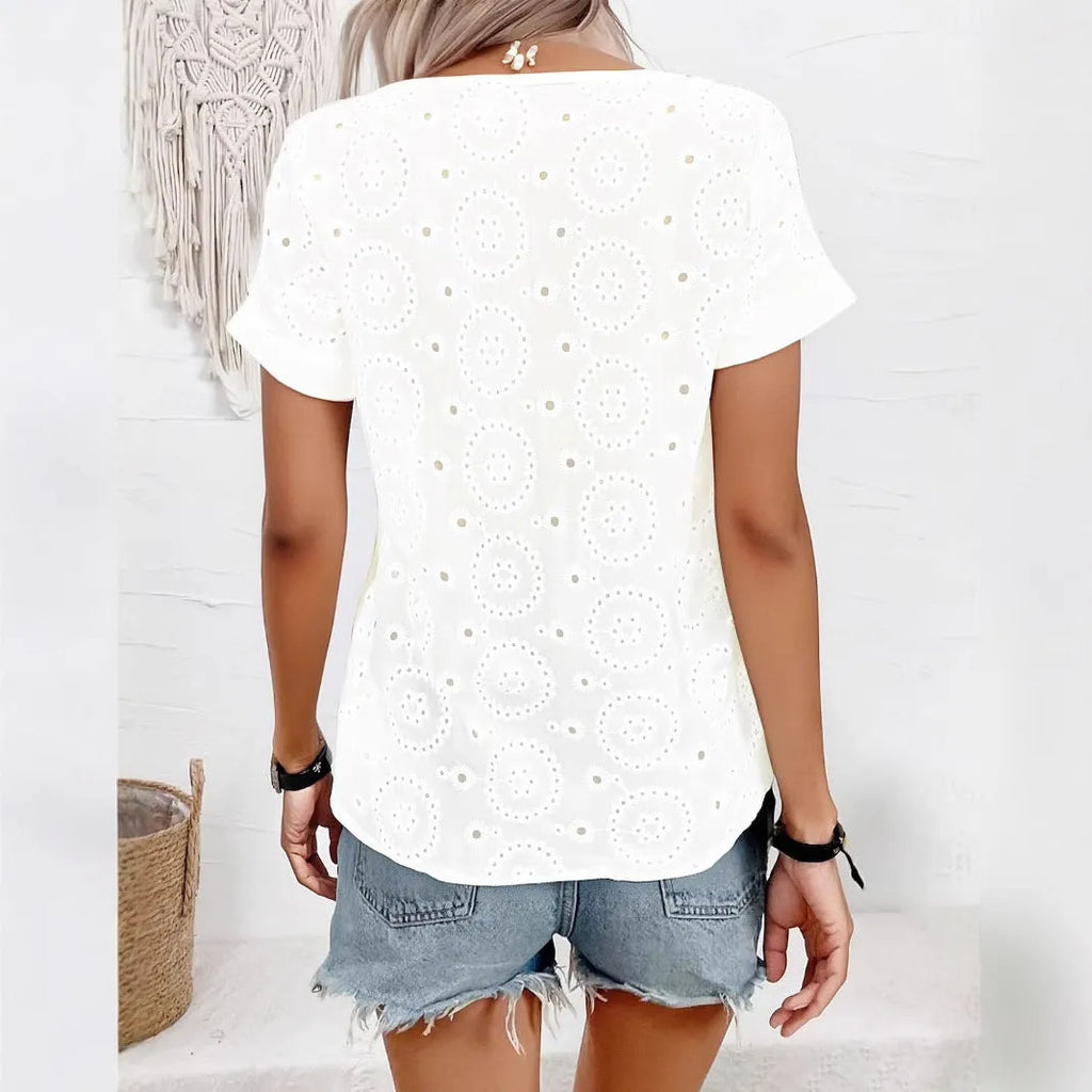 White women's V-neck T-shirt with lace hollow out design detail on the front, loose fit short sleeves.