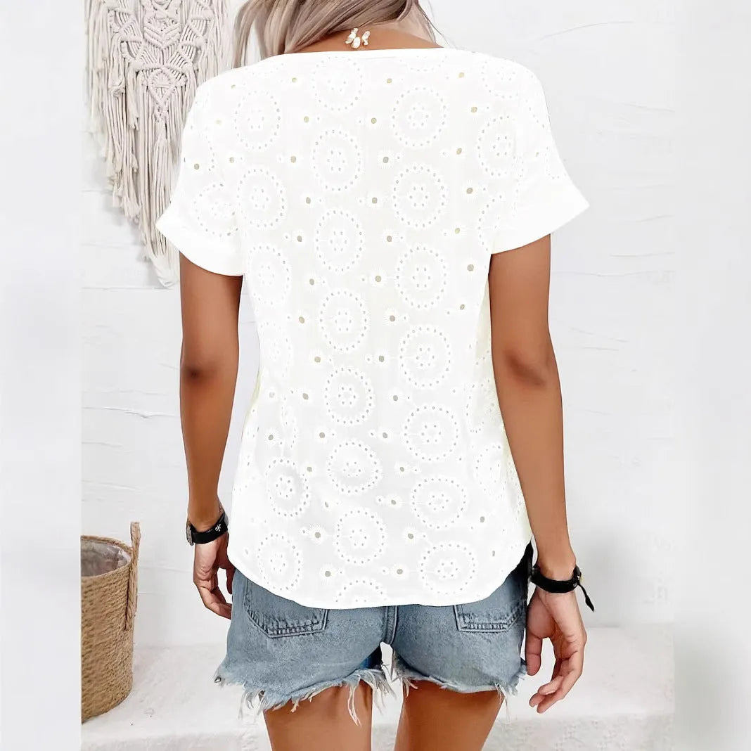 White women's V-neck T-shirt with lace hollow out design detail on the front, loose fit short sleeves.