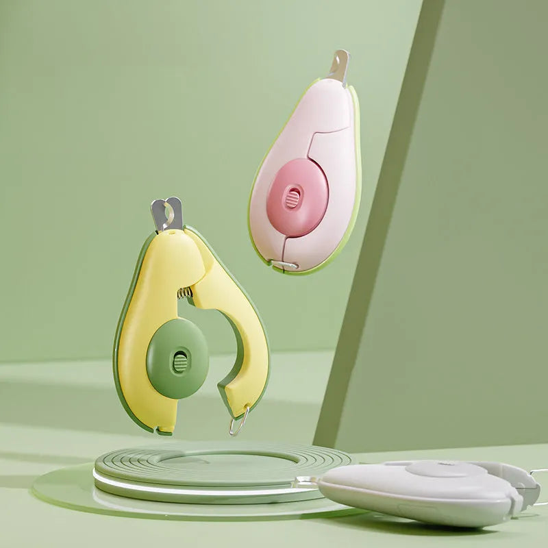 Professional LED pet nail clipper for small dogs and cats in green, pink, and white colours.