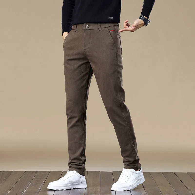 Men's fleece-lined slim fit tapered casual cotton trousers in black, shown flat for detail