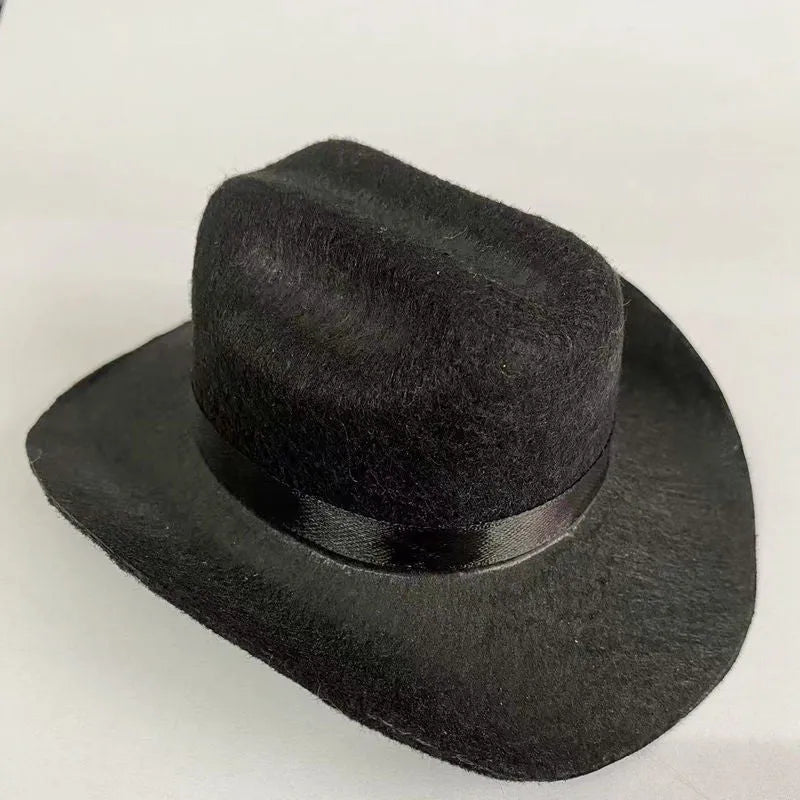 British cowboy-style hat for a cat on a mannequin head, showing brown colour with a black ribbon trim.
