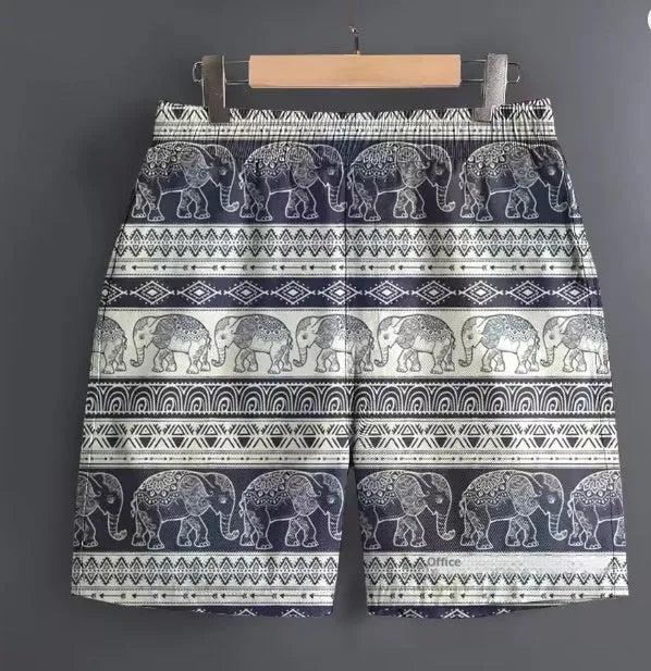 Men's casual polyester sports shorts in a camouflage print pattern, laid flat.