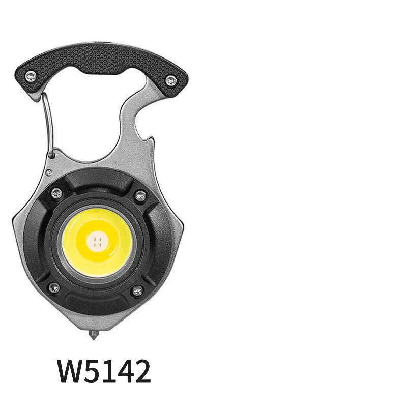 Compact silver and black multifunctional keychain flashlight with keyring, display screen, and integrated window breaker tool.