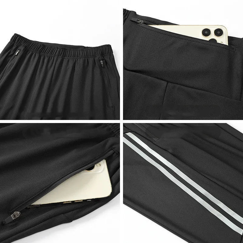 Men's black running trousers with mid waist and full length polyester construction for exercise