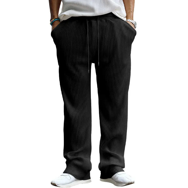 Men's straight-leg loose casual trousers in khaki colour showing high waist and relaxed fit