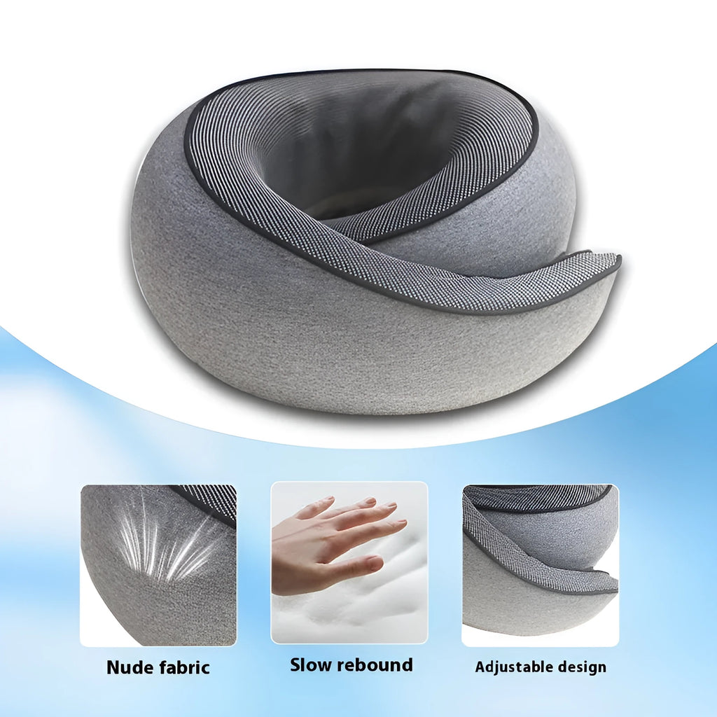 U-shaped grey memory foam travel neck pillow with a black storage bag on a plain background.