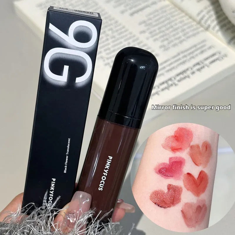 Black Shiny Makeup Mirror Lip Lacquer tube showing six colour options including tomato, orange brown, brown, rose, red, and sweet potato shades