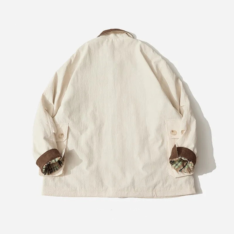Green and apricot casual jacket with side seam pockets, long sleeves, and solid pattern