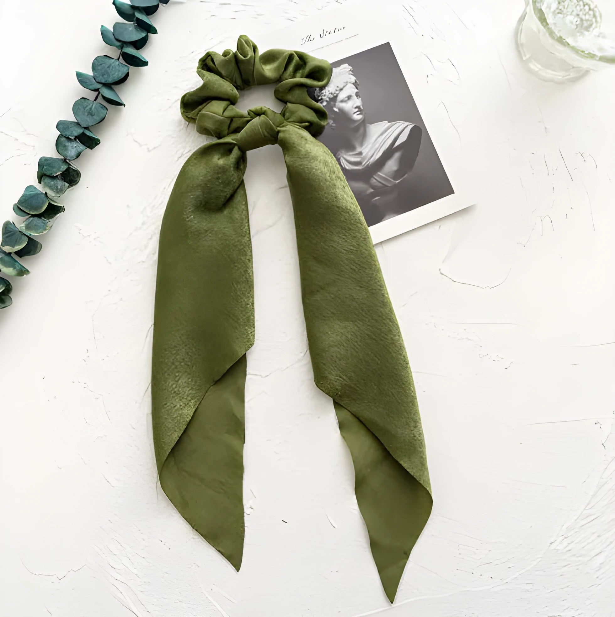 Spring dark green cloth hair tie with large intestine ring design and floral bandeau decoration