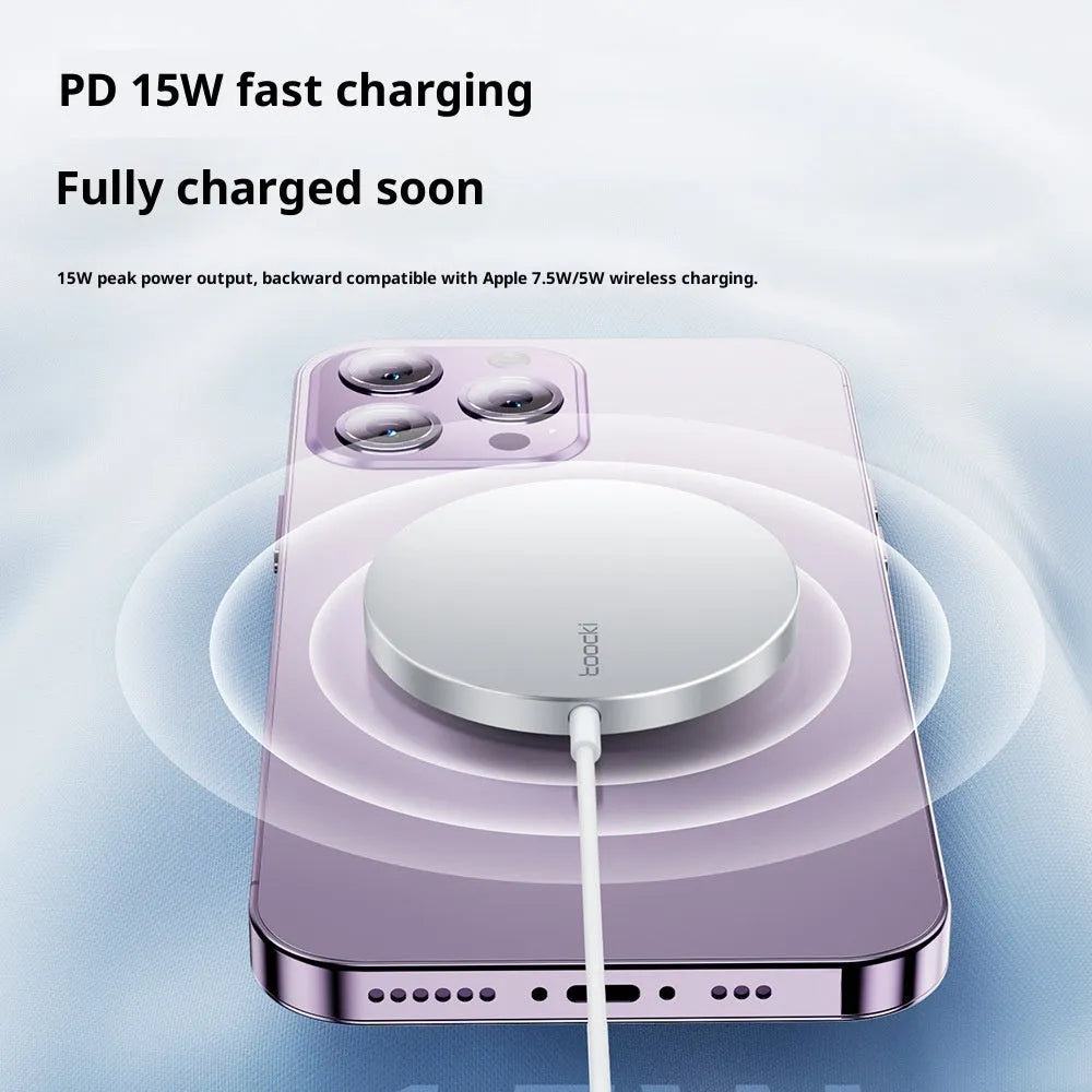 White simulation Apple style 15W strong magnetic suction wireless charger on a desk