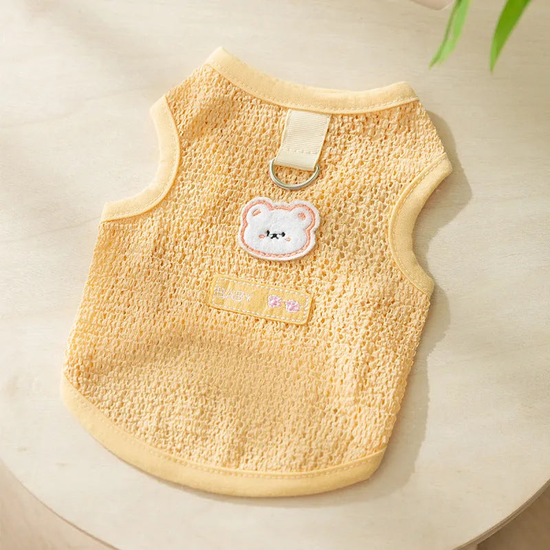 Green knitted cat clothes with bear patch showing hollowed-out breathable design