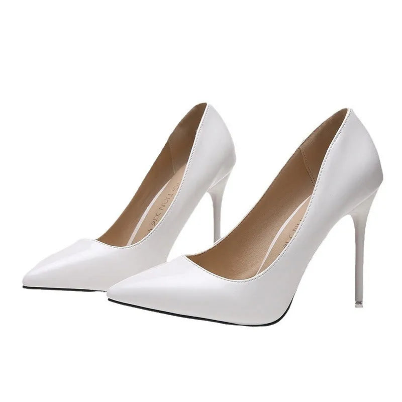 Women's pointed toe stiletto high heel pump in apricot colour with super high heel.