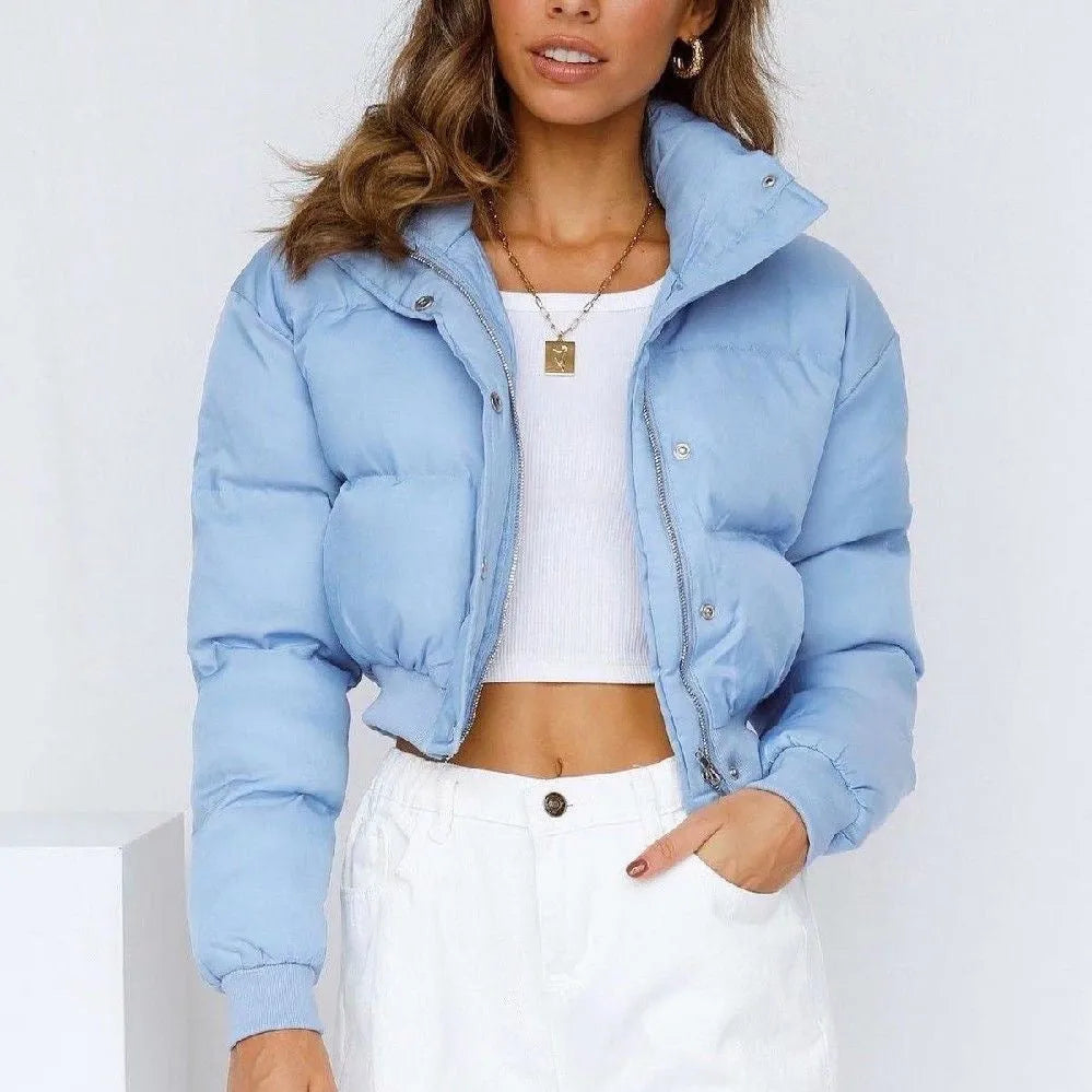Women's loose fit polyester leisure jacket in blue, grey, black or milky white with long sleeves