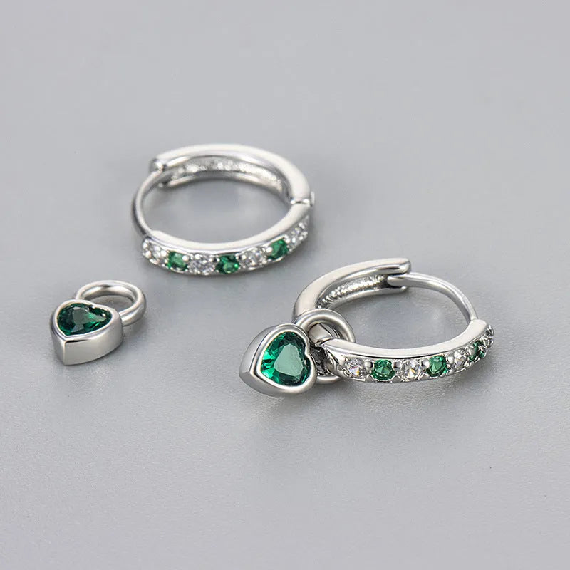 Women's heart-shaped ear clips with a coloured stone, available in gold or white gold colour.