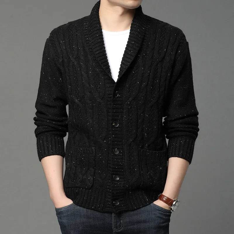 Men's knitted cardigan in jacquard pattern, shown in a neutral colour with a straight cut and open front.