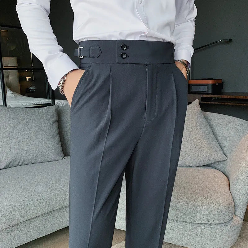 Straight-leg casual trousers in solid colour on hanger showing waistband and leg detail
