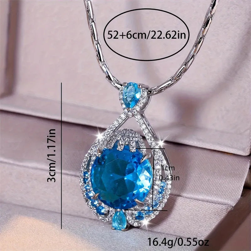 Blue geometric women's necklace with fireworks cut gems on water wave chain