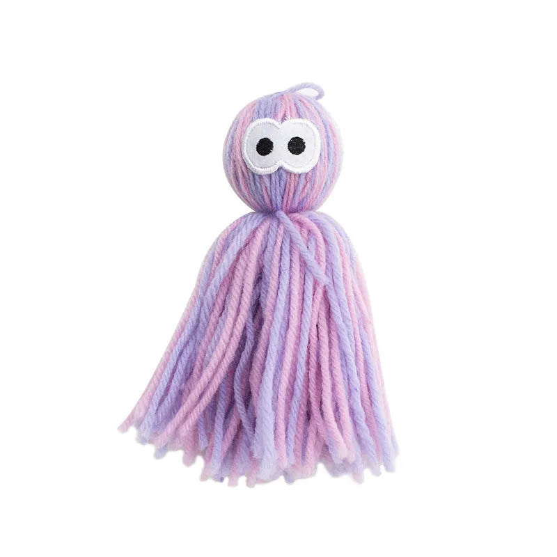 Bite-resistant wool cat ball toy with hanging attachment in blue grey, pink and blue, or pink purple colours