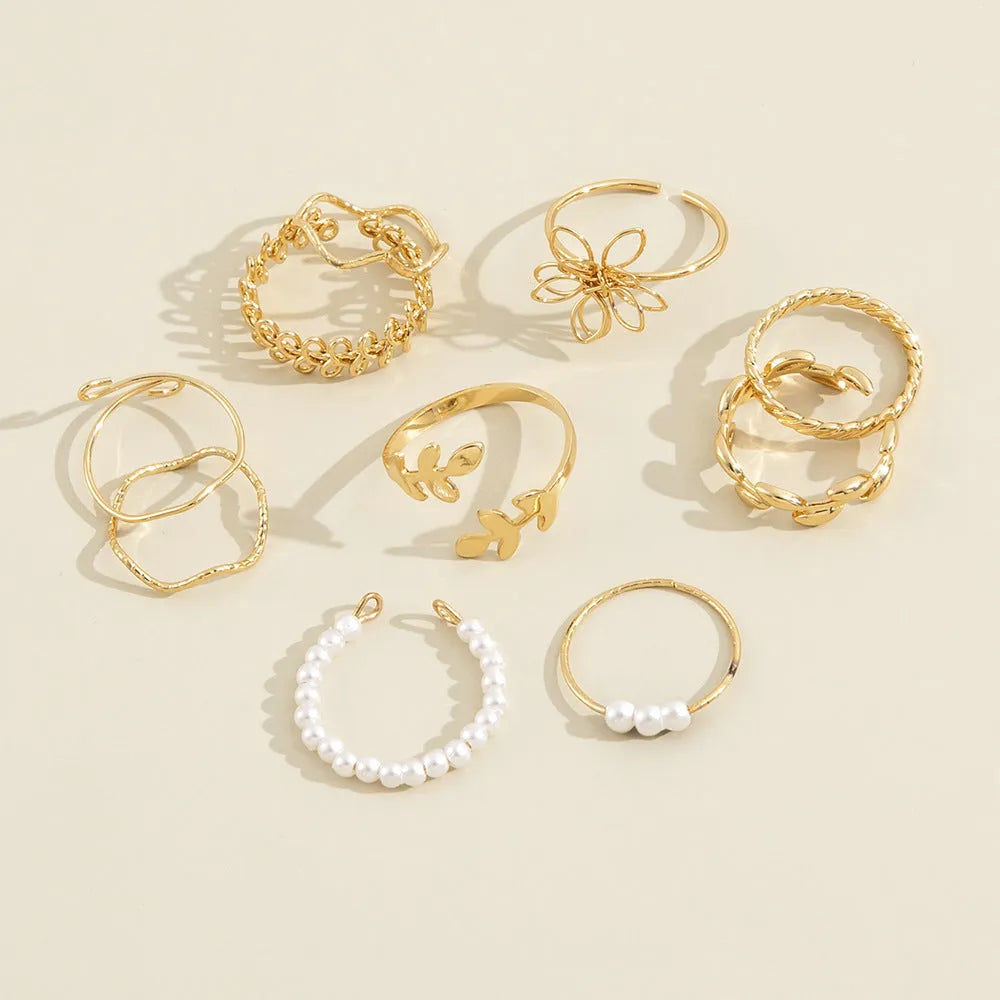 Gold openwork flower ring set for women with intricate floral designs