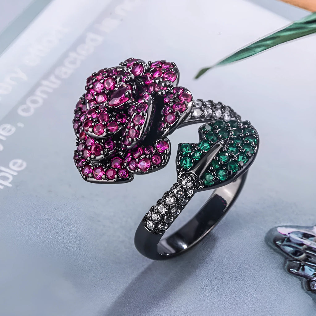 Gold-plated black gold ring with simulation red corundum stone and geometric flower design