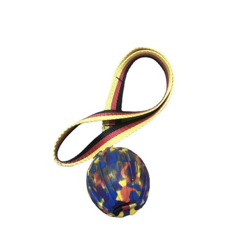 Floating camouflage and yellow EVA pet training ball with knotted tether in three diameter sizes for water retrieval
