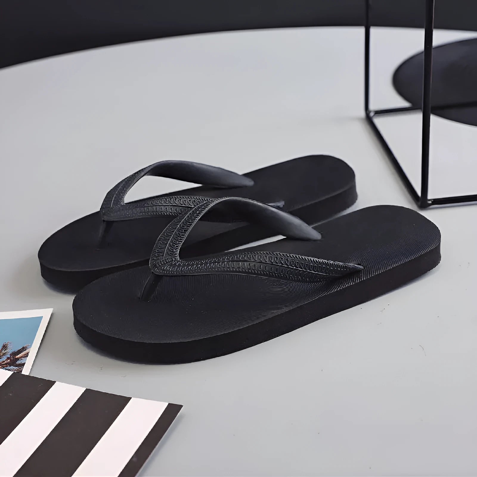 Casual rubber flip-flop with fish label on non-slip sole, shown in green colour.