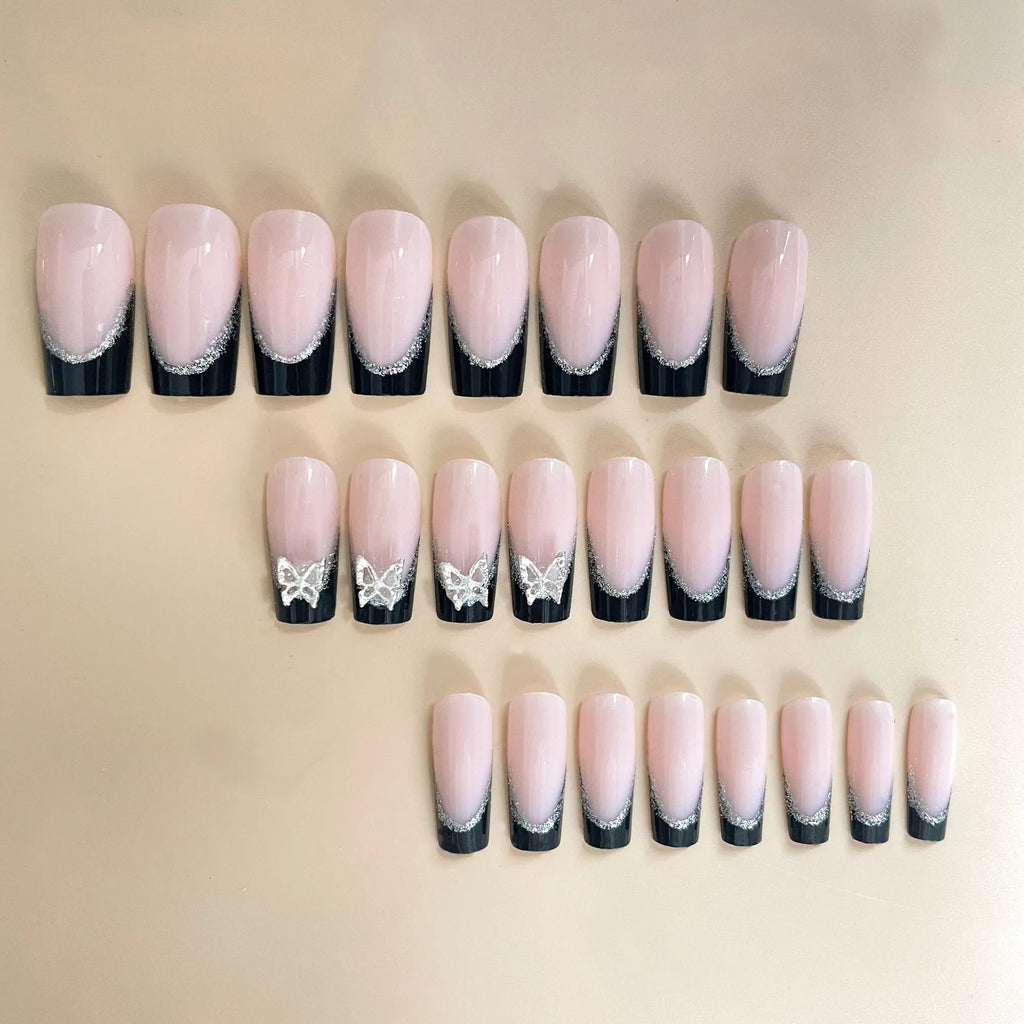 Black French style thin glittering butterfly nail armour set on medium-length nails