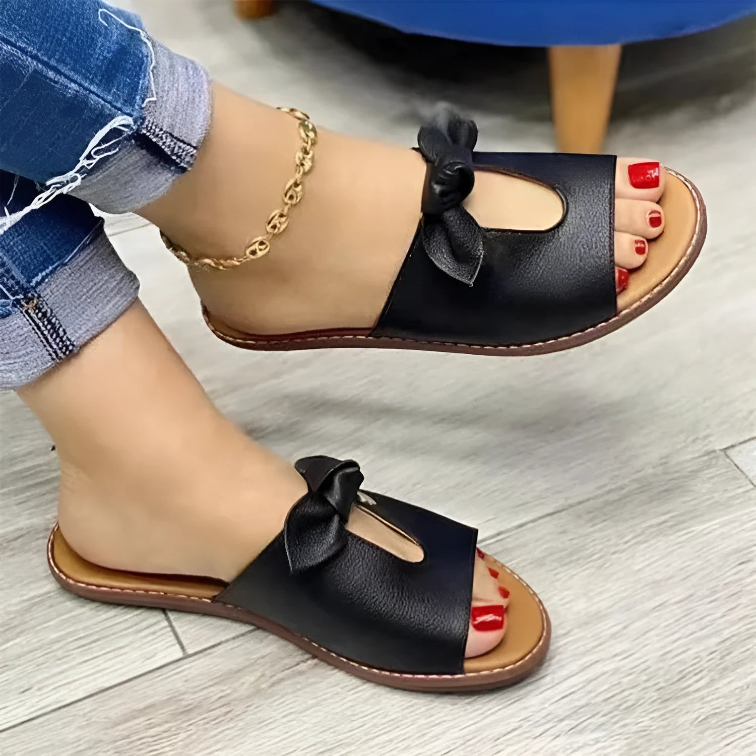 Women's black fish mouth sandals with a decorative bow on the artificial PU upper.
