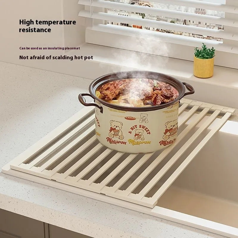 Foldable milky white stainless steel kitchen draining rack shown open and collapsed.