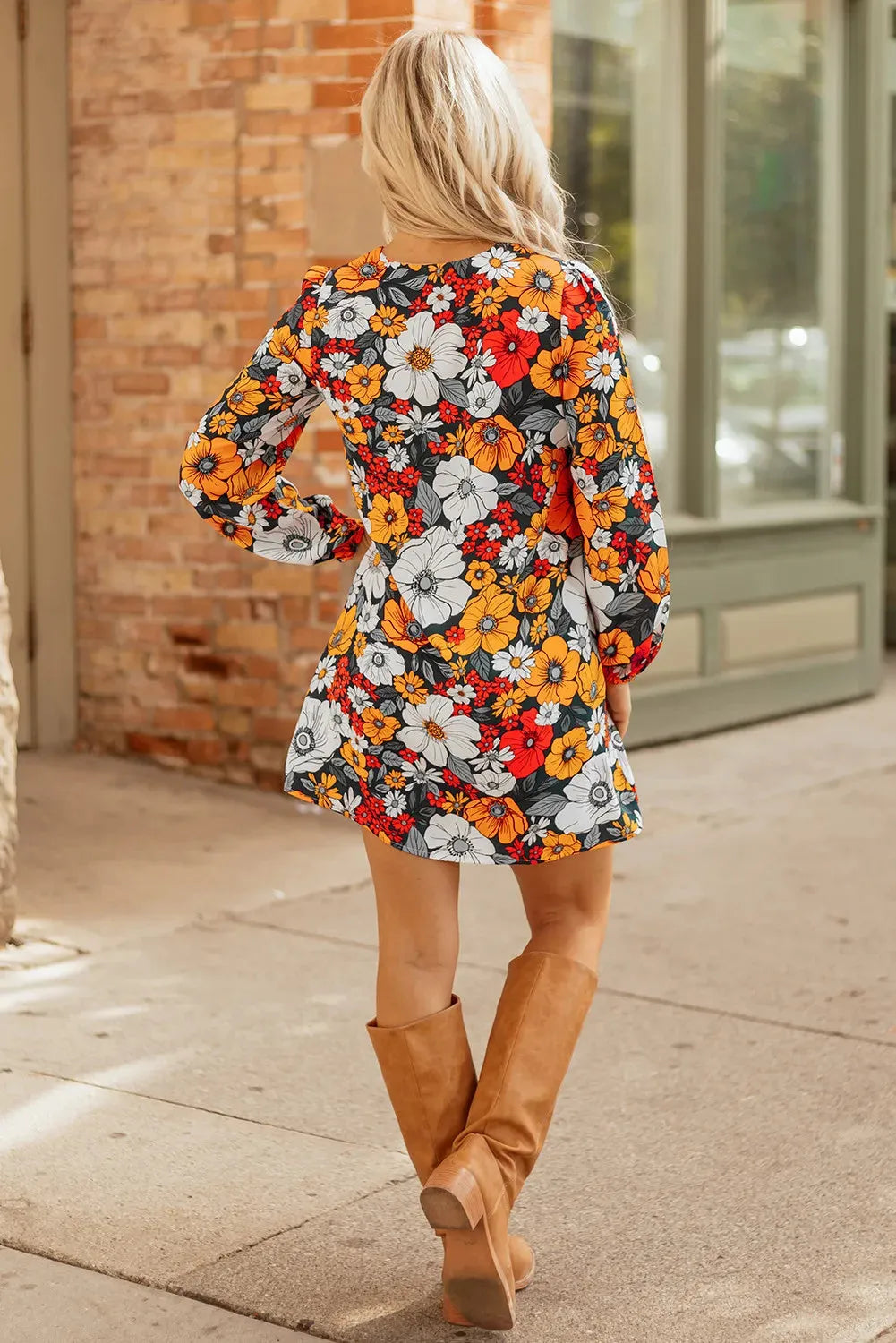 Orange floral print V-neck mini dress with striped lace detailing and long sleeves