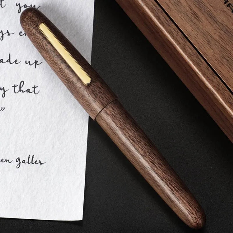 Wooden fountain pen with rotating cap shown in Alpine Pear finish with EF nib for business writing